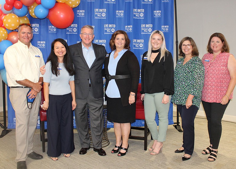 Dallas Mudd (from left), Ana Phakhin, Jackie Hancock, Christina Hinds, Sarah Josey, Dina Wood and Rhonda Brammel, United Way of Northwest Arkansas staff members, welcome supporters to the campaign kickoff luncheon Aug. 26 at The Jones Center in Springdale.
(NWA Democrat-Gazette/Carin Schoppmeyer)