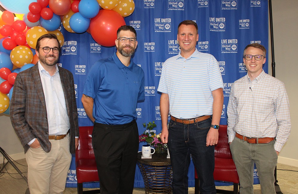 Marshall Saviers (from left), Ryan Patterson, Peter Glenn and Joshua Manning help support the United Way of Northwest Arkansas at the kickoff luncheon.
(NWA Democrat-Gazette/Carin Schoppmeyer)