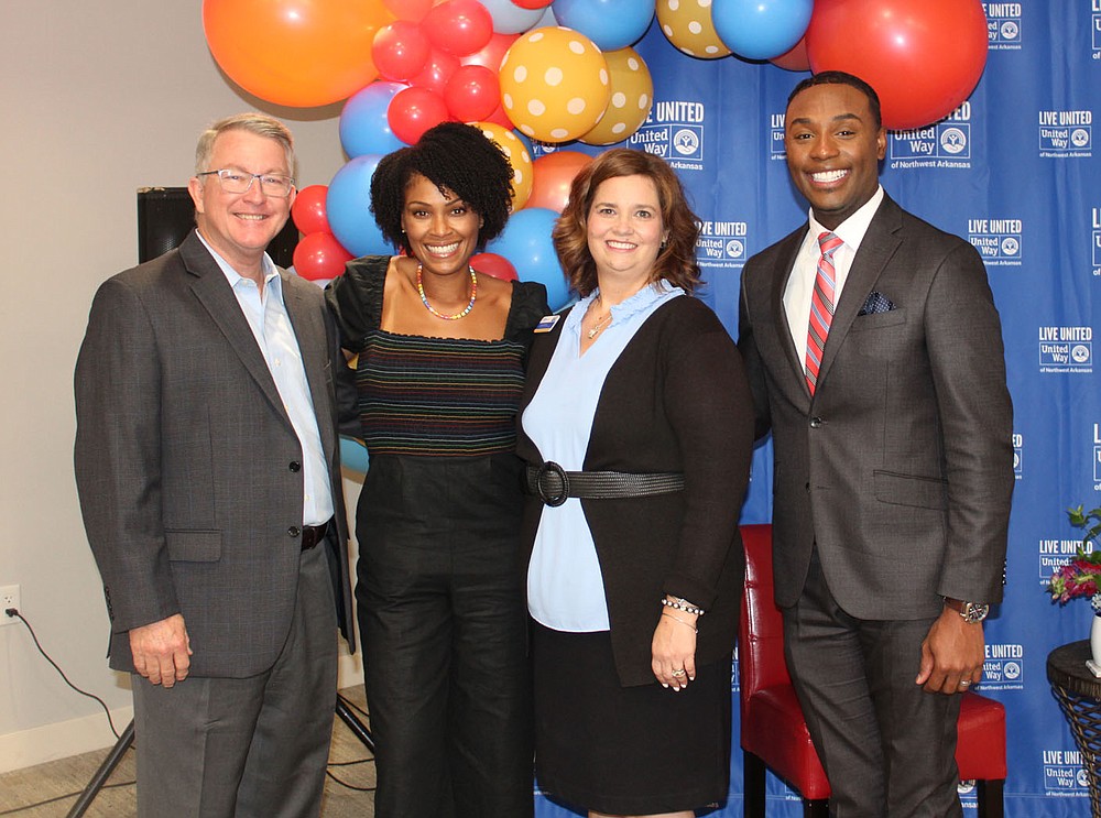 Jackie Hancock, UWNWA CEO and president (from left), Danyell Musselman, Christina Hinds, UW vice president of corporate engagement and Tavares Jones stand for a photo at the kickoff luncheon.
(NWA Democrat-Gazette/Carin Schoppmeyer)