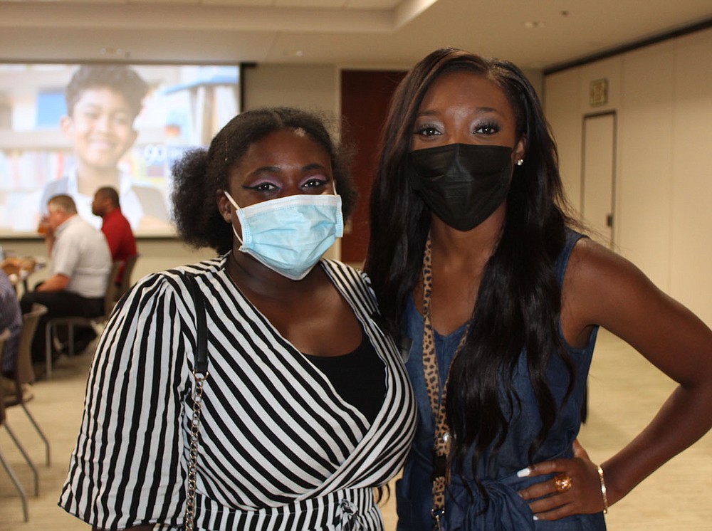 Allyssa Hicks (left) and Erika Guy attend the kickoff luncheon.
(NWA Democrat-Gazette/Carin Schoppmeyer)