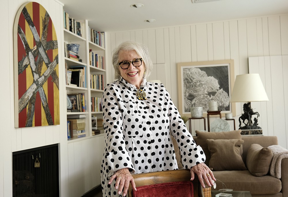 Senior influencer Sandra Sallin, 80, poses for a portrait at home, Friday, Aug. 20, 2021, in Los Angeles. Sallin is among a growing number of seniors making names for themselves on social media. (AP Photo/Chris Pizzello)