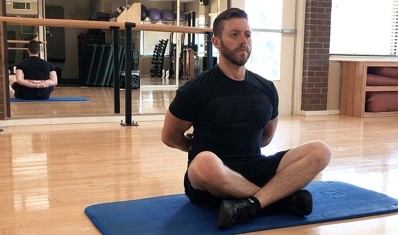 MASTER CLASS: Try this behind-the-back stretch to relax body and