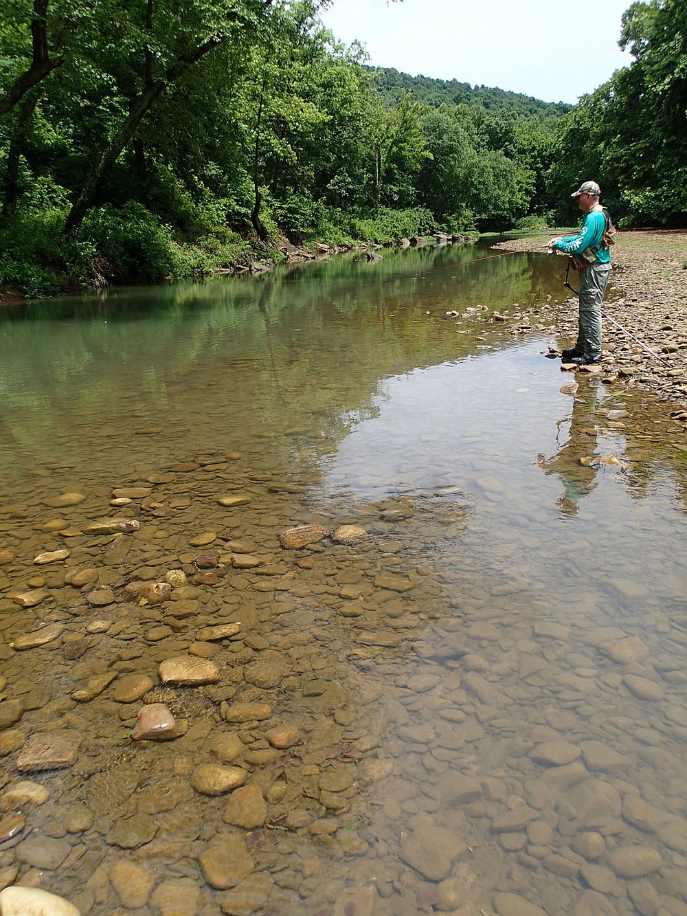 Small water produced good fishing for Pat Bodishbaugh in July 2021 on the upstream reaches of the Kings River. Sunfish and smallmouth bass were eager to bite on his fishing afternoon.
(NWA Democrat-Gazette/Flip Putthoff)