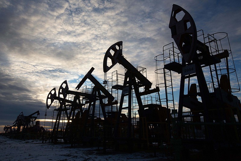 Oil pumping jacks in an oilfield near Neftekamsk, in the Republic of Bashkortostan, Russia, on Nov. 19, 2020. MUST CREDIT: Bloomberg photo by Andrey Rudakov.