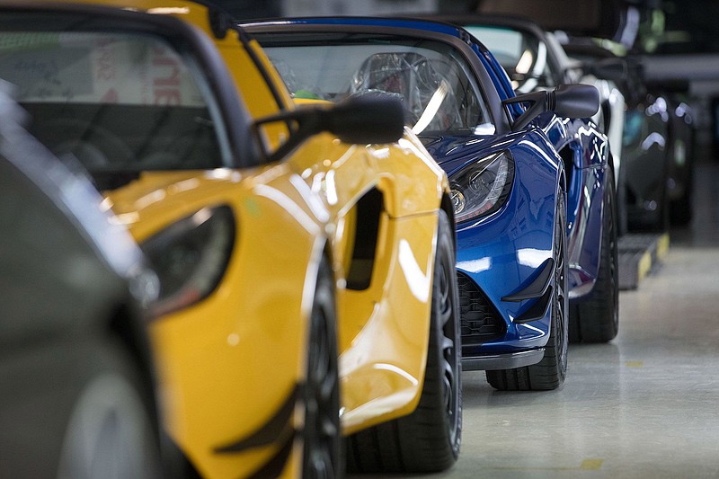 Finished Lotus sports cars sit on the inspection line at the Group Lotus automobile factory in Hethel, England, on Aug. 10, 2017. MUST CREDIT: Bloomberg photo by Simon Dawson