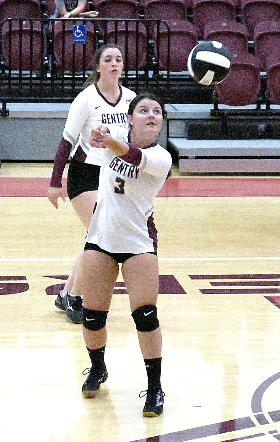 Westside Eagle Observer/RANDY MOLL
Gentry junior Afton Finnell receives a serve during play against Huntsville at Gentry High School on Thursday.