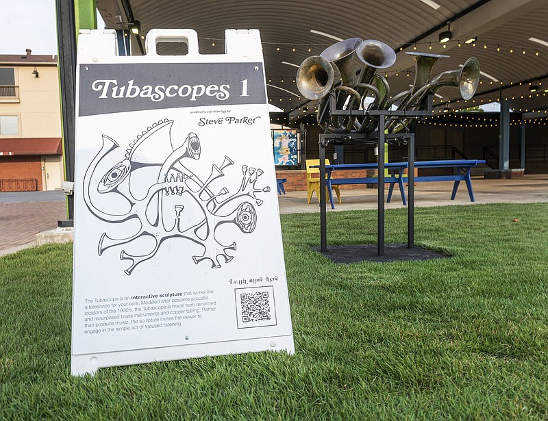 An art pieces titled TubaScopes by Steve Parker' as part of his work Listening Objects is seen in Turnbow Park in downtown Springdale.   (NWA Democrat-Gazette/Spencer Tirey)