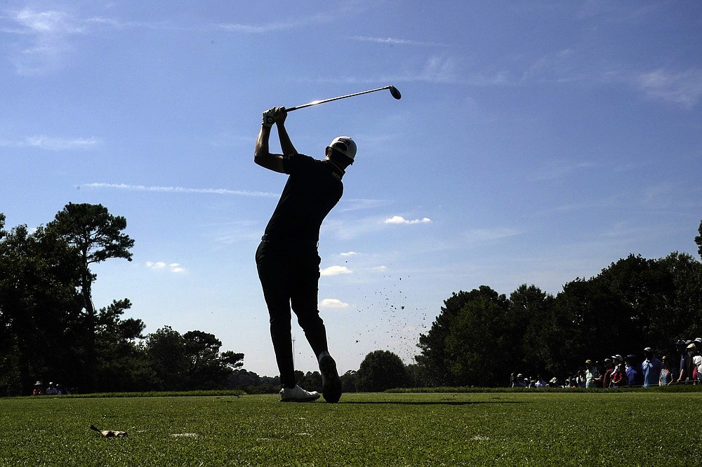 Patrick Cantlay hits from the third tee during the third round of the Tour Championship golf tournament Saturday, Sept. 4, 2021, at East Lake Golf Club in Atlanta. (AP Photo/Brynn Anderson)