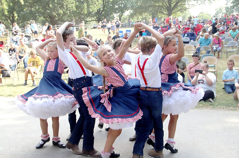 Boots and Bows is one of 63 exhibition square dance groups that performed Saturday and Monday afternoons at the Clothesline Fair. In all, 81 groups performed, 63 younger groups and 18 older, competitive groups. Only one had to drop out because of covid-19 quarantines.