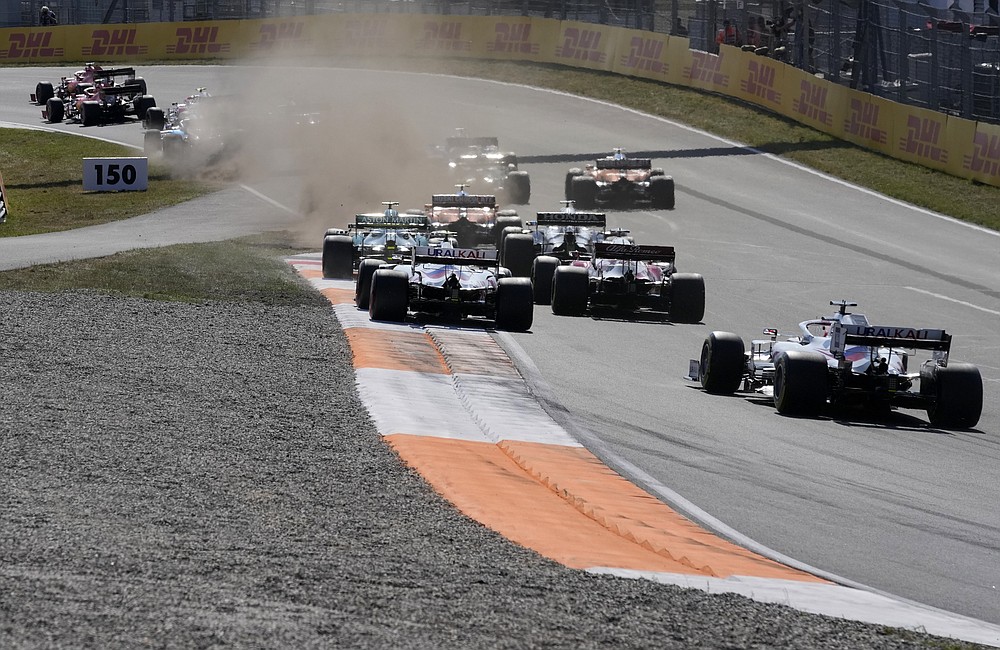 Red Bull driver Max Verstappen of the Netherlands leads at the start of the Formula One Dutch Grand Prix, at the Zandvoort racetrack, Netherlands, Sunday, Sept. 5, 2021. (AP Photo/Peter Dejong)