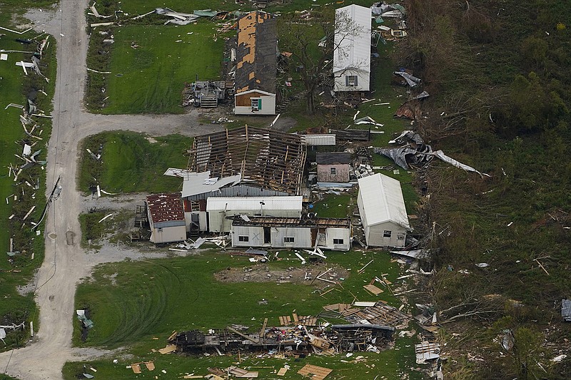 In this aerial photo, the remains of destroyed homes are seen in the aftermath of Hurricane Ida, Monday, Sept. 6, 2021, in Lafitte, La. (AP Photo/Matt Slocum)
