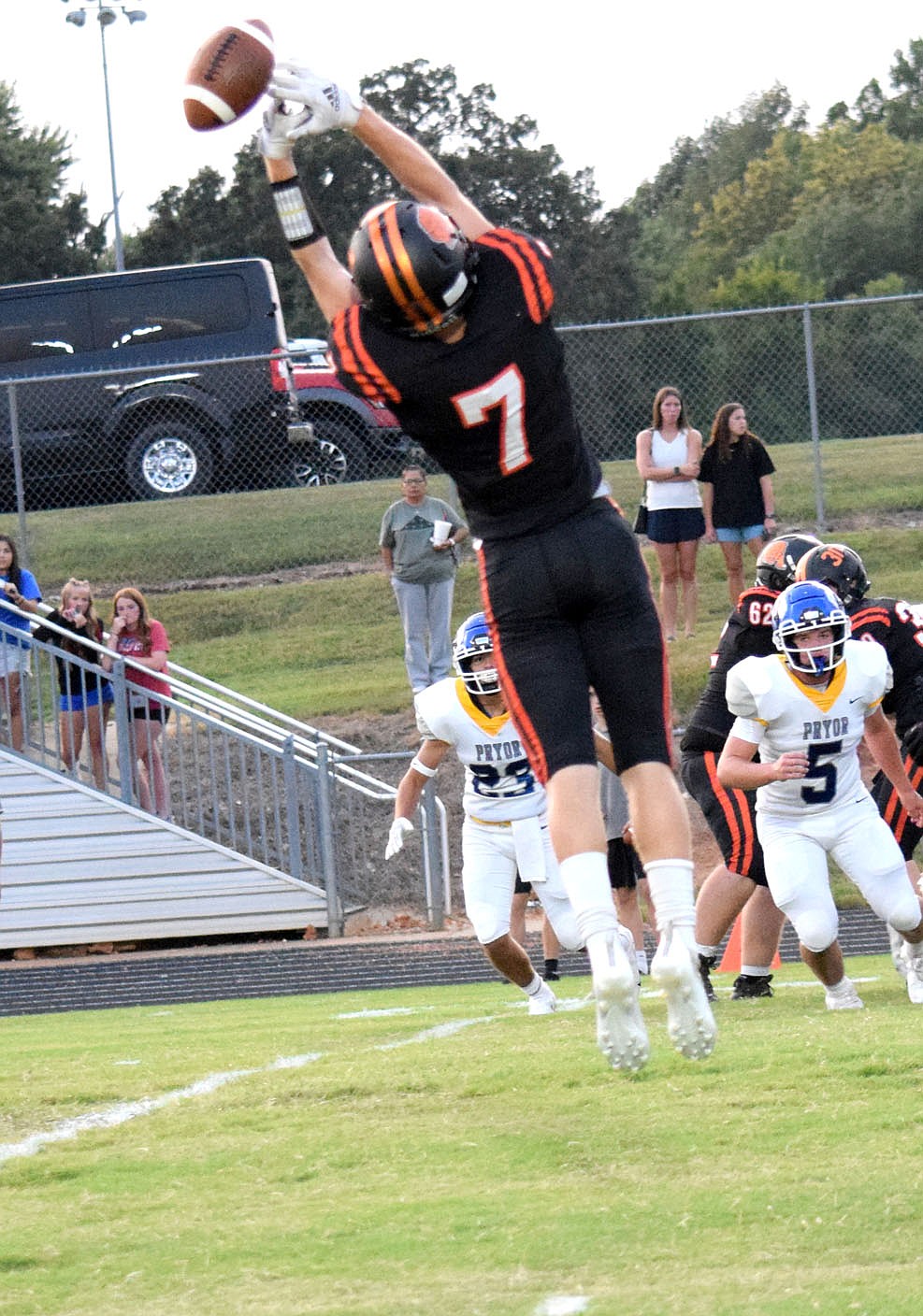Westside Eagle Observer/MIKE ECKELS
Mason Meeker (Lions 7) tries to catch a pass from quarterback Rhett Hilger during the second quarter of the Gravette-Pryor, Oklahoma, football contest at Lion Stadium Friday night. Meeker needed another six inches to be able to catch Hilger's overthrown pass.