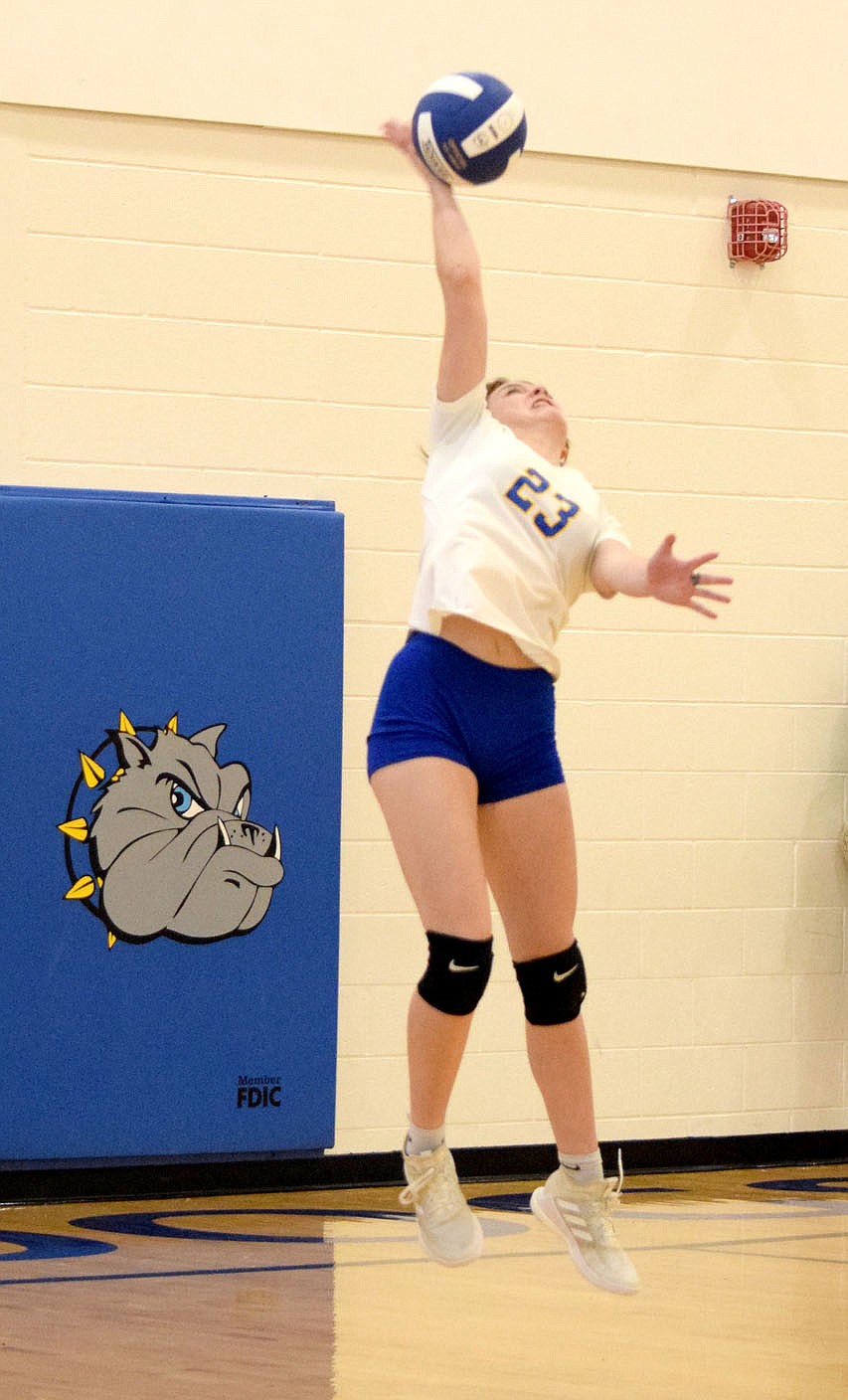 Westside Eagle Observer/MIKE ECKELS
Lady Bulldog Brooklyn Todd serves the ball to the Lady Highlander side of the court during the second set of the Decatur-Eureka Springs volleyball match in the gym at Decatur Middle School Sept. 7.