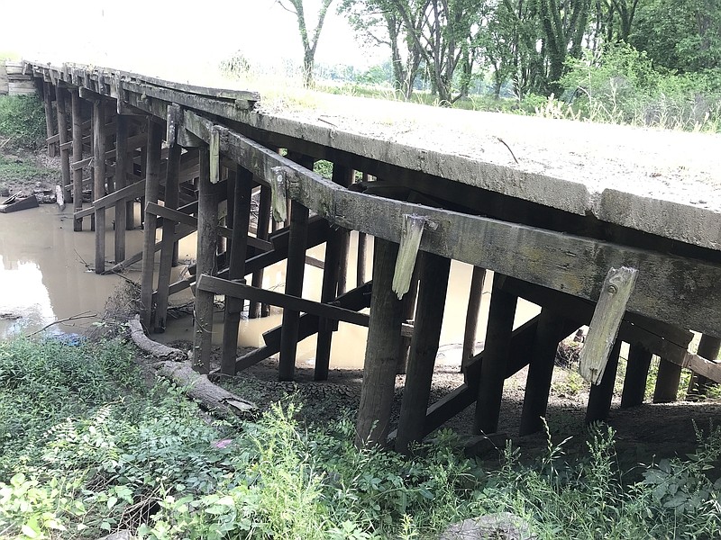 Wilson Road bridge (shown here) completely collapsed approximately three weeks ago, according to Jefferson County Judge Gerald Robinson. That bridge, along with the Mulberry Grove Road bridge, cross the Wabbaseka Bayou. Both were mandated by the Arkansas Department of Transportation to be closed. (ARDot)