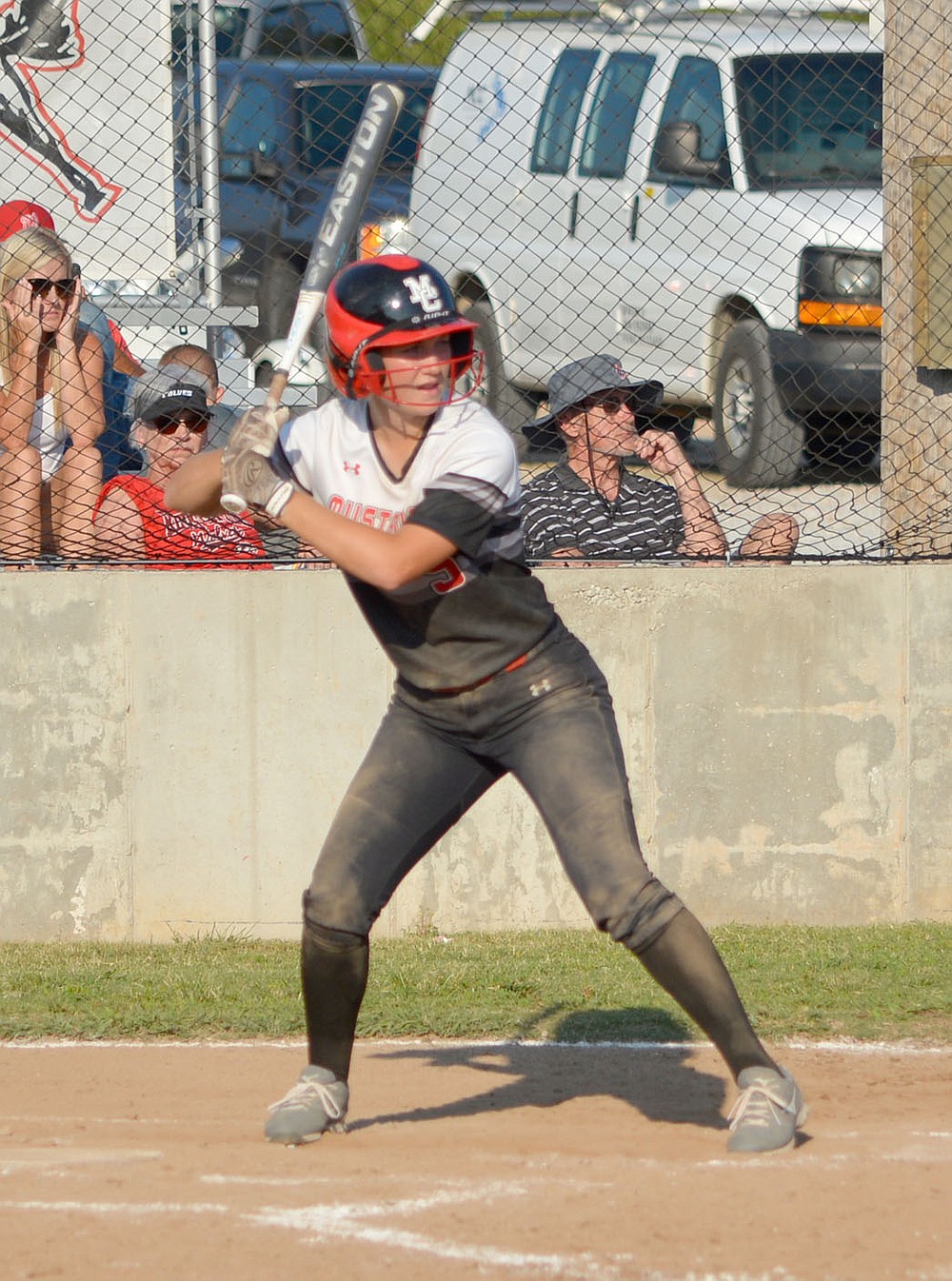 Al Gaspeny/Special to the McDonald County Press
The Lady Mustangs' Melanie Gillming waits for the pitch before hitting a single during Tuesday's home game against Reeds Spring. McDonald County won 13-1 in five innings, improving to 4-1.