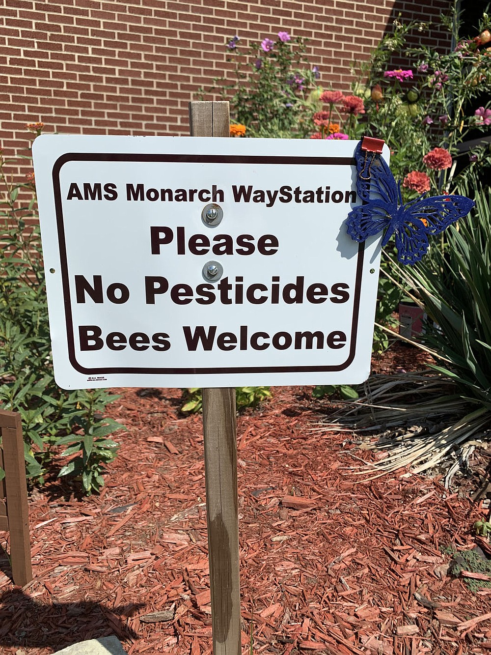 ALEXUS UNDERWOOD/SPECIAL TO MCDONALD COUNTY PRESS A sign marks the   butterfly garden which is a host to many different insects.