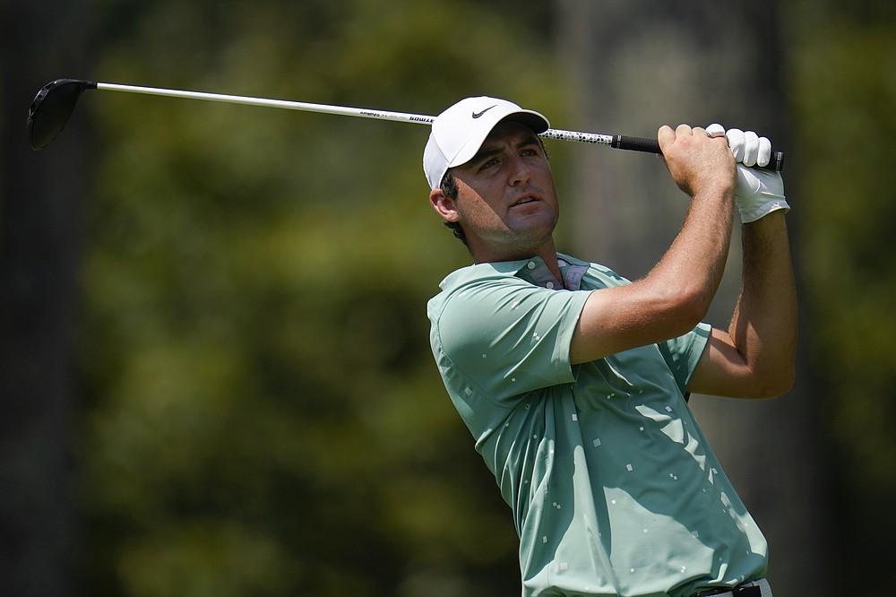 Scottie Scheffler tees off from the second hole during the second round of the BMW Championship golf tournament, Friday, Aug. 27, 2021, at Caves Valley Golf Club in Owings Mills, Md. (AP Photo/Julio Cortez)
