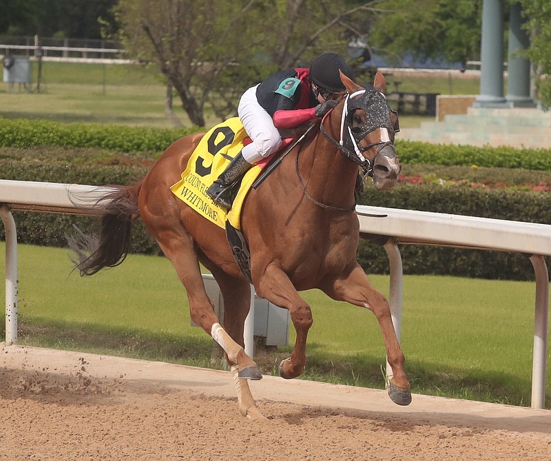 Jockey Joe Talamo coasts across the wire aboard Whitmore to win the Count Fleet Sprint Handicap on April 18, 2020, at Oaklawn. - Photo by Richard Rasmussen of The Sentinel-Record