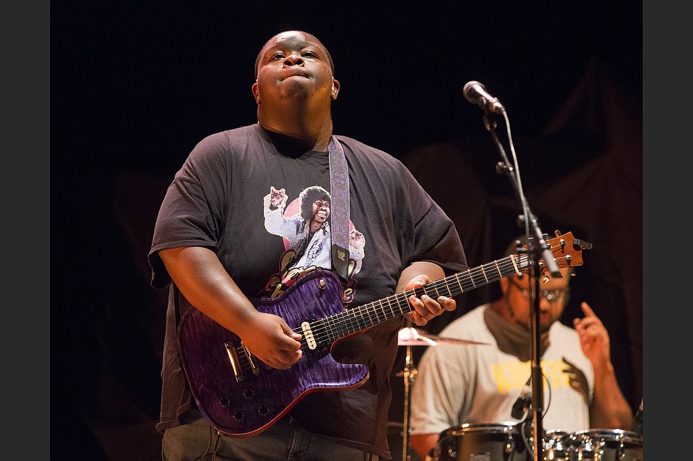 Christone “Kingfish” Ingram performs as the opening act for Vampire Weekend during their “Father of the Bride Tour” in 2019. “I can hear music in people’s footsteps, and I can hear melodies in the sound of the rain and the blowing wind,” Ingram says. (Owen Sweeney/Invision/AP)