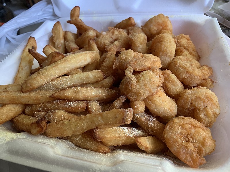 The 20-piece shrimp special at Blue Dolphins on Camp Robinson Road in North Little Rock turned out to be livelier — more Cajun style than Deep South — than we expected. (Arkansas Democrat-Gazette/Eric E. Harrison)