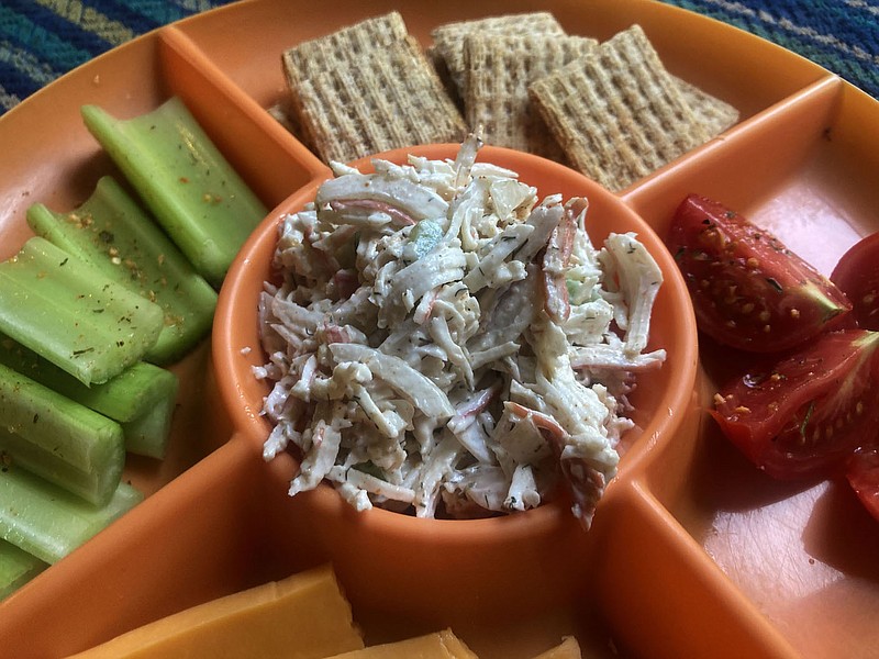 Seafood salad makes a great appetizer at a fish fry or any gathering. It's tasty and easy to make with only six ingredients.
(NWA Democrat-Gazette/Flip Putthoff)
