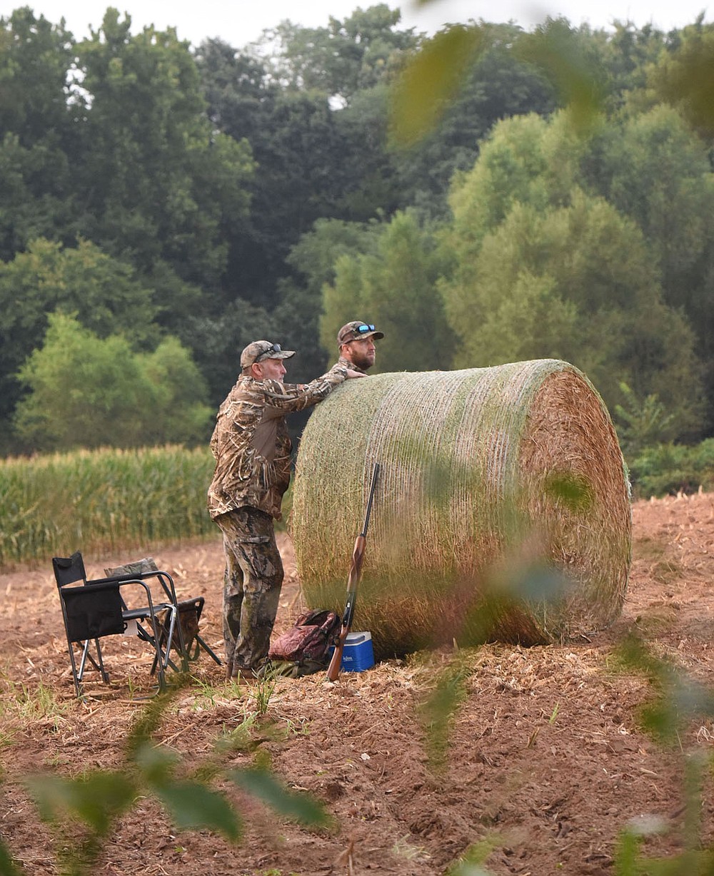 Shooting stations at the dove field Sept. 4 2021 are marked with round bales of hay.
(NWA Democrat-Gazette/Flip Putthoff)