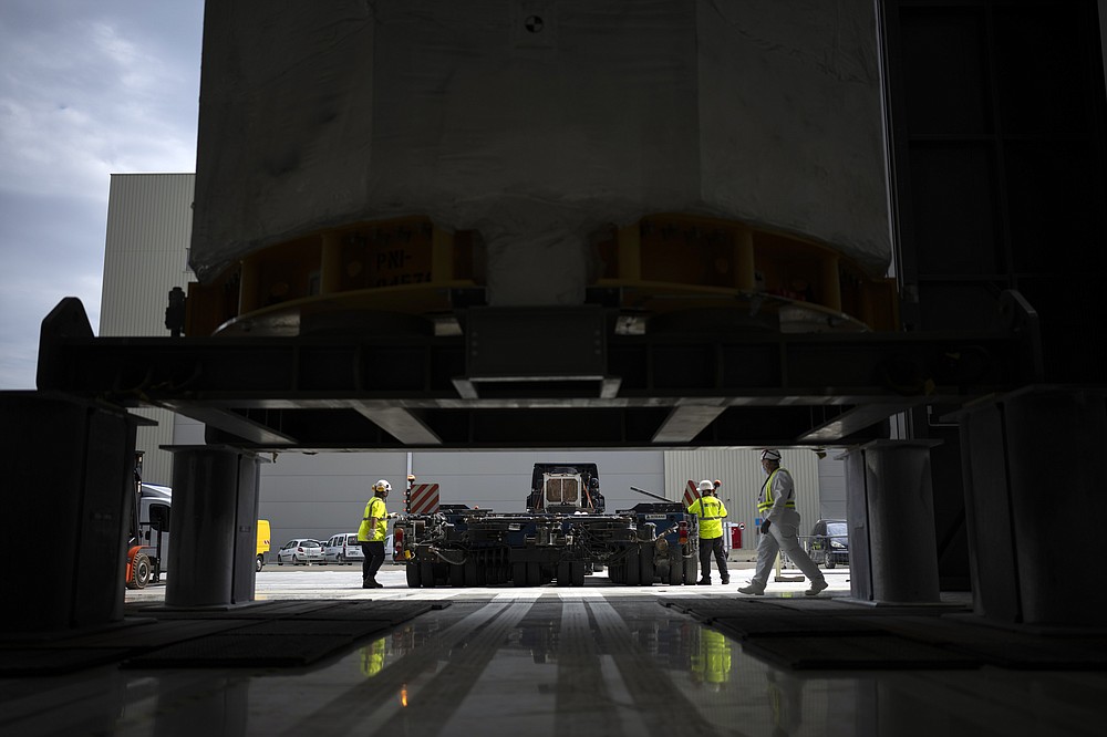 A central solinoid magnet for the ITER project arrives in Saint-Paul-Lez-Durance, France, Thursday, Sept. 9, 2021. Scientists at the International Thermonuclear Experimental Reactor in southern France took delivery of the first part of a massive magnet so strong its American manufacturer claims it can lift an aircraft carrier. (AP Photo/Daniel Cole)