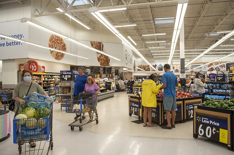 Grocery shoppers stock up on essentials at a Walmart in D'Iberville, Miss., Friday, Aug. 27, 2021, in preparation for Hurricane Ida. (Hannah Ruhoff/The Sun Herald via AP)