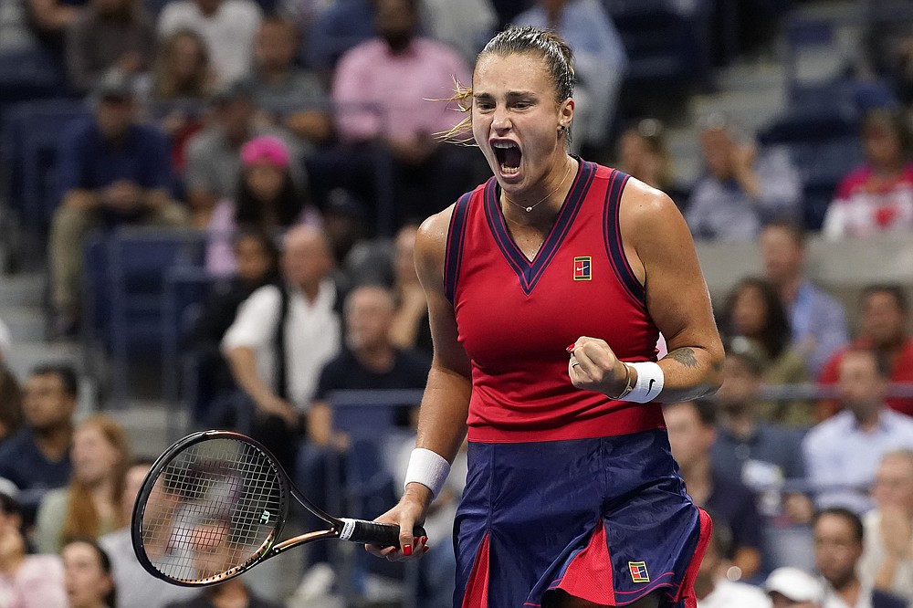 Aryna Sabalenka,of Belarus, reacts after scoring a point against Leylah Fernandez, of Canada, during the semifinals of the US Open tennis championships, Thursday, Sept. 9, 2021, in New York. (AP Photo/Elise Amendola)