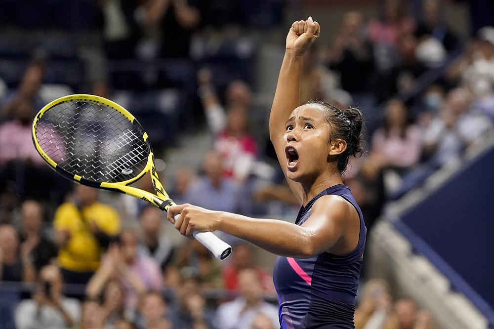 Leylah Fernandez, of Canada, reacts after winning the first set against Aryna Sabalenka,of Belarus, during the semifinals of the US Open tennis championships, Thursday, Sept. 9, 2021, in New York. (AP Photo/Elise Amendola)