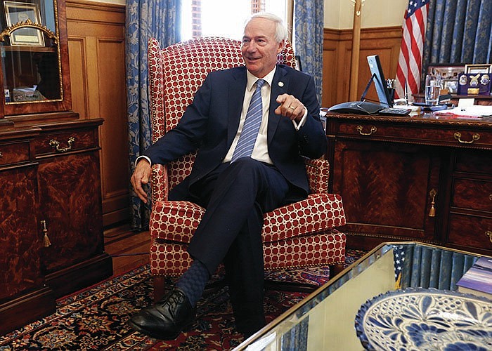 Gov. Asa Hutchinson talks about his time working for the Department of Homeland Security and his role after the Sept. 11 attacks during an interview on Wednesday, Sept. 1, 2021, at the state Capitol in Little Rock. (Arkansas Democrat-Gazette/Thomas Metthe)