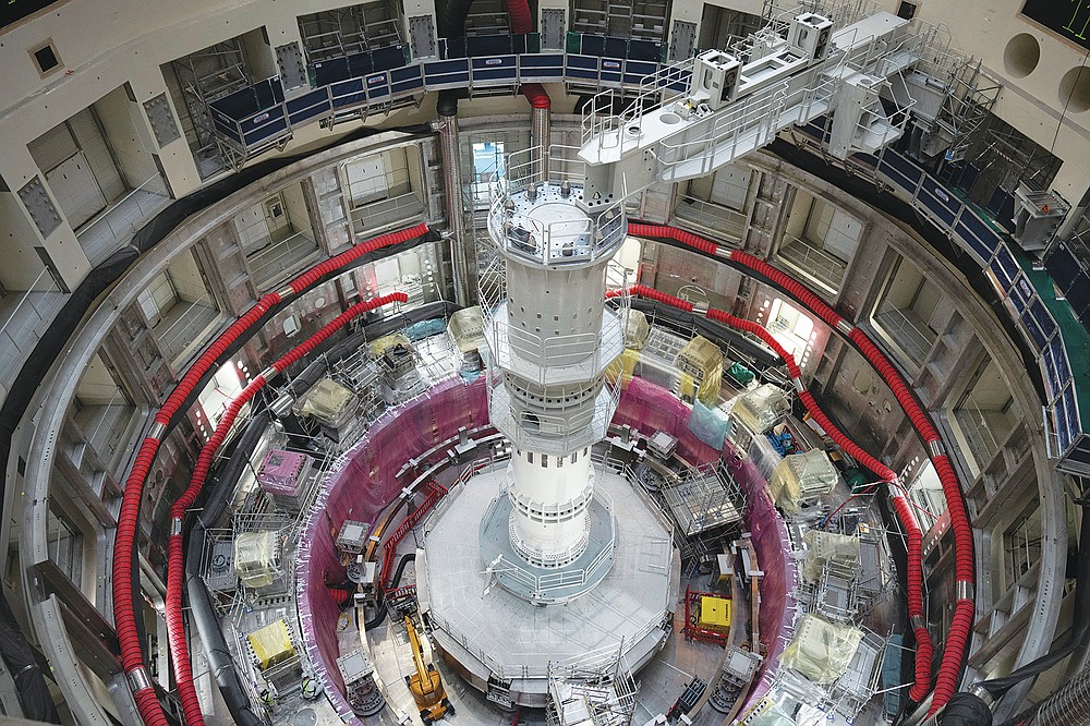 The ITER Tokamak machine is pictured in Saint-Paul-Lez-Durance, France, Thursday, Sept. 9, 2021. Scientists at the International Thermonuclear Experimental Reactor in southern France took delivery of the first part of a massive magnet so strong its American manufacturer claims it can lift an aircraft carrier. (AP Photo/Daniel Cole)