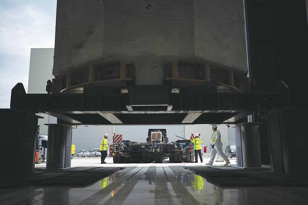 A central solinoid magnet for the ITER project arrives in Saint-Paul-Lez-Durance, France, Thursday, Sept. 9, 2021. Scientists at the International Thermonuclear Experimental Reactor in southern France took delivery of the first part of a massive magnet so strong its American manufacturer claims it can lift an aircraft carrier. (AP Photo/Daniel Cole)