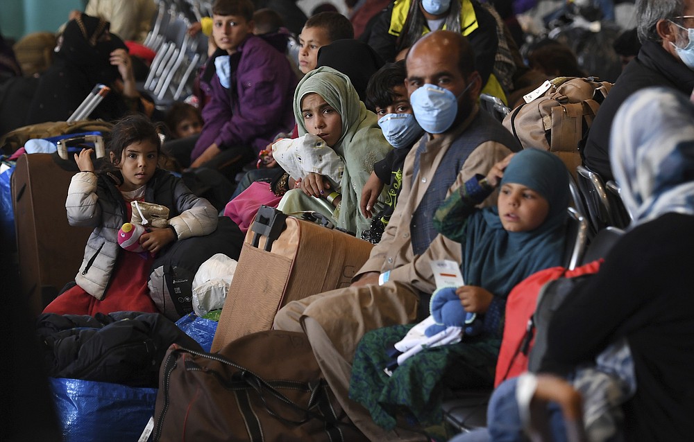 Afghan refugees are processed inside Hangar 5 at the&#xa0;Ramstein U.S. Air Base in Germany Wednesday, Sept. 8, 2021. U.S. Secretary of State Antony Blinken arrived at the base where he will meet with his German counterpart for talks on Afghanistan. (Olivier Douliery/Pool Photo via AP)