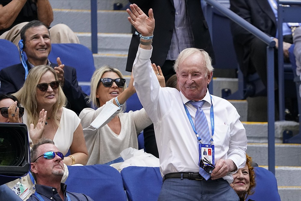 CORRECTS SPELLING TO ROD, INSTEAD OF RON - Former pro tennis player Rod Laver, right, waves to fans during the semifinals of the U.S. Open tennis tournament between Felix Auger-Aliassime, of Canada, and Daniil Medvedev, of Russia, Friday, Sept. 10, 2021, in New York. (AP Photo/Seth Wenig)