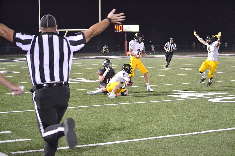 ANNETTE BEARD PEA RIDGE TIMES/Tigers Camden Patterson (No. 7) and Caleb Bankston (No. 8) rejoice after teammate intercepted a pass intended for Blackhawk senior Will Anderson, No. 11, Friday night in Blackhawk Stadium.