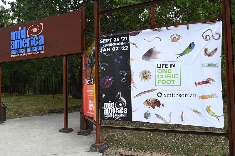 A banner for the new Smithsonian traveling exhibit, “Life in One Cubic Foot,” opening Sept. 25 hangs at Mid-America Science Museum. - Photo by Tanner Newton of The Sentinel-Record