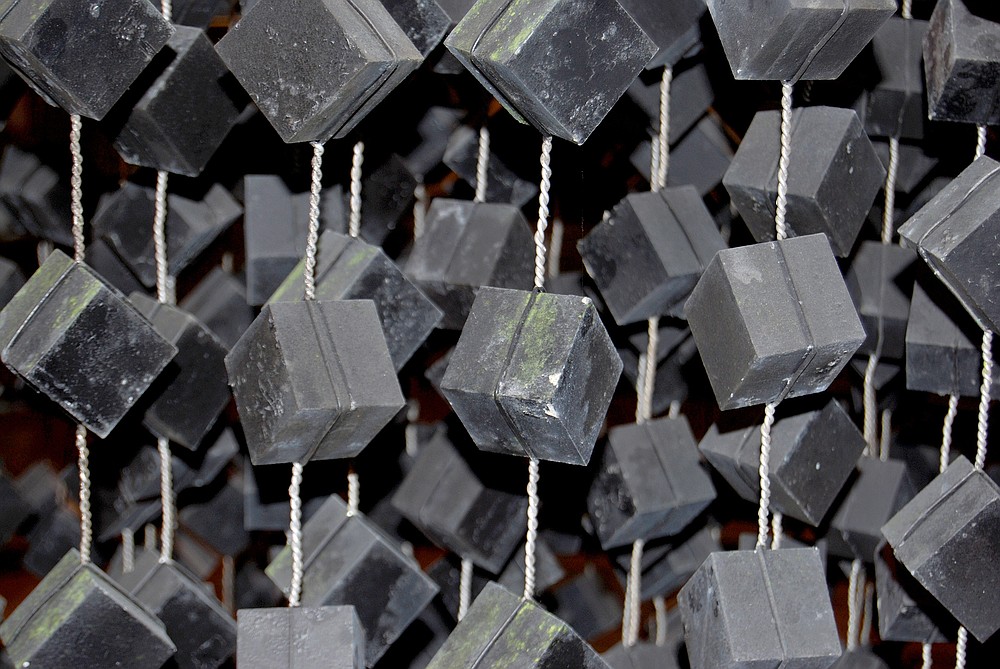 A photo provided by Felix König shows uranium cubes on chains in the model of the Haigerloch reactor in Germany. Scientists at the Pacific Northwest National Laboratory and the University of Maryland are working to determine whether three uranium cubes they have in their possession were produced by Germany’s failed nuclear program during World War II. (Felix König via The New York Times) -- NO SALES; FOR EDITORIAL USE ONLY WITH NYT STORY SLUGGED NAZI URANIUM BY JESUS JIMÉNEZ FOR SEPT. 10, 2021. ALL OTHER USE PROHIBITED. --