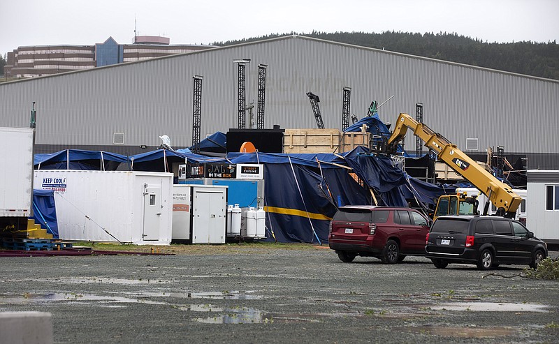 The tent of Iceberg Alley, where concerts had been taking place through the week, suffered major damages after Hurricane Larry crossed over Newfoundland's Avalon Peninsula in the early morning hours, in St. John's, Saturday, Sept. 11, 2021. (Paul Daly/The Canadian Press via AP)