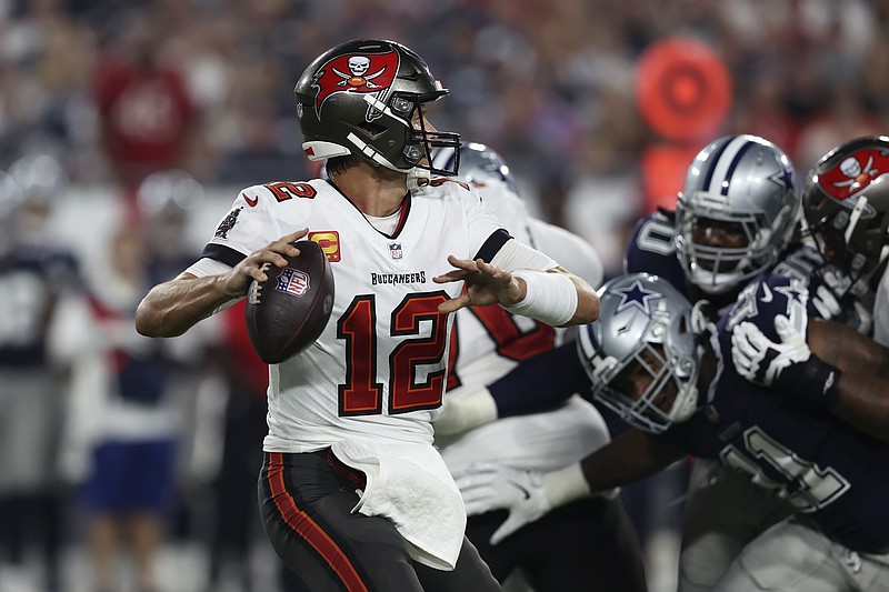 Tampa Bay Buccaneers quarterback Tom Brady (12) throws a pass against the Dallas  Cowboys during the