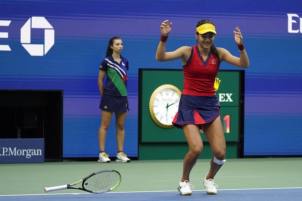 Emma Raducanu, of Britain, reacts after defeating Leylah Fernandez, of Canada, during the women's singles final of the US Open tennis championships, Saturday, Sept. 11, 2021, in New York. (AP Photo/Seth Wenig)