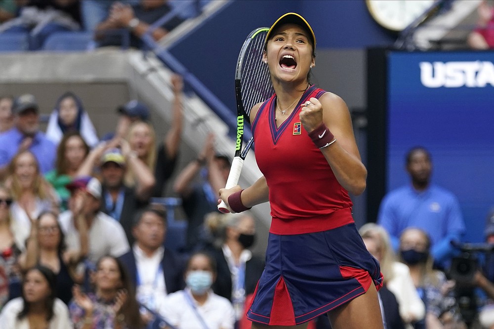 Emma Raducanu, of Britain, reacts after scoring a point against Leylah Fernandez, of Canada, during the women's singles final of the US Open tennis championships, Saturday, Sept. 11, 2021, in New York. (AP Photo/Seth Wenig)