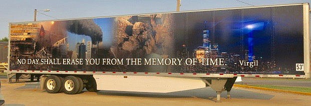 Westside Eagle Observer/SUSAN HOLLAND
A semi trailer that is part of R&R Solutions trucking fleet memorializes those who lost their lives in the Sept. 11, 2001, terrorist attacks. The trailer, one of a series of vehicles with patriotic designs operated by the company, was parked in CV's parking lot Saturday and served as a dramatic backdrop to the fire department's remembrance ceremony.