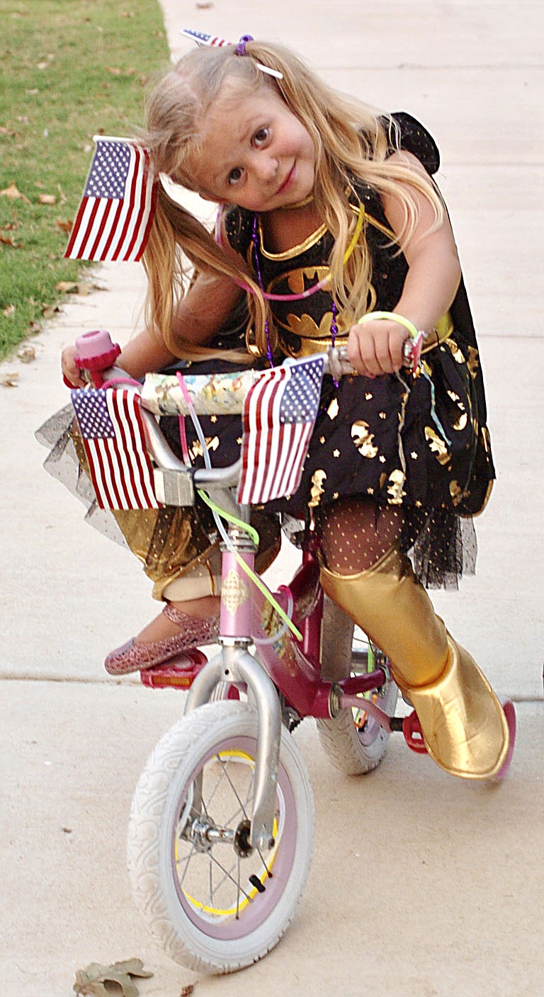 Westside Eagle Observer/RANDY MOLL
Zola Underwood, 4, came in full costume to ride in the glow ride on Saturday in Gentry.