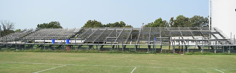 Westside Eagle Observer/MIKE ECKELS
Work continues Saturday afternoon on the new bleachers at Bulldog Stadium in Decatur. Once the remaining aluminum seats are fastened down and the press box hoisted in place, the bleachers will be completed in time for the first home game Sept. 24.