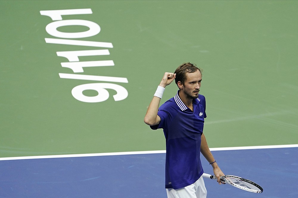 Daniil Medvedev, of Russia, reacts after scoring a point against Novak Djokovic, of Serbia, during the men's singles final of the US Open tennis championships, Sunday, Sept. 12, 2021, in New York. (AP Photo/Seth Wenig)