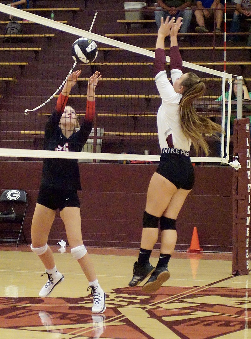 Westside Eagle Observer/RANDY MOLL
Gentry junior Madison Voyles goes up to block a Pea Ridge volley during play at Gentry High School on Thursday.