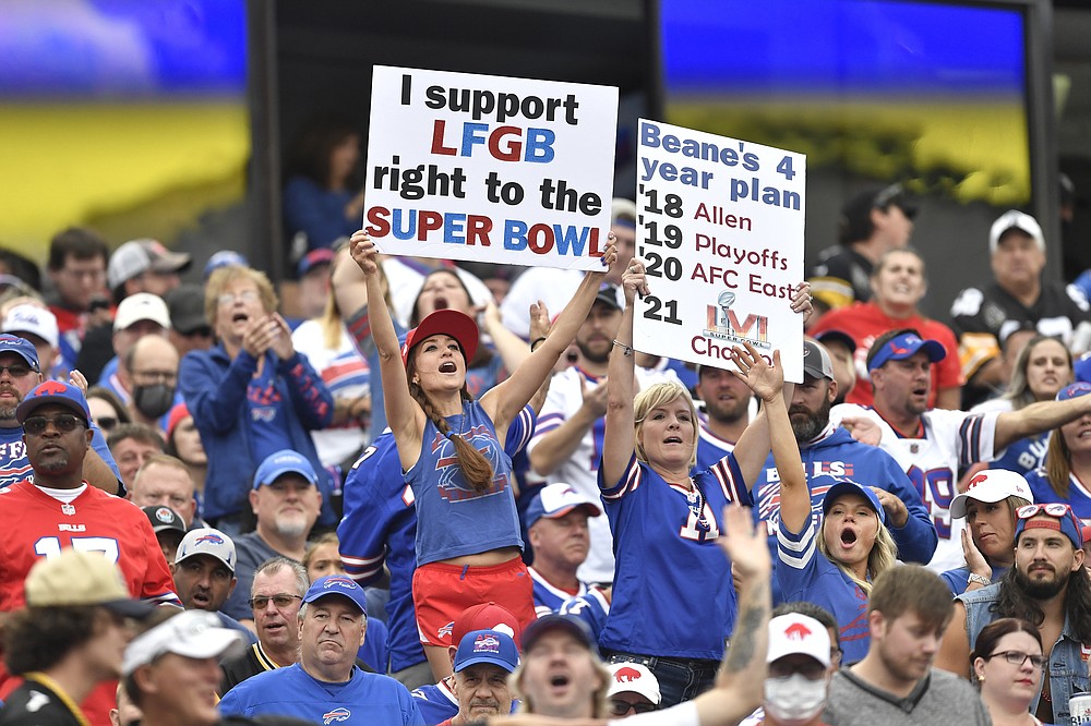 Fans cheer during the first half of an NFL football game between the Buffalo Bills and the Pittsburgh Steelers in Orchard Park, N.Y., Sunday, Sept. 12, 2021. (AP Photo/Adrian Kraus)