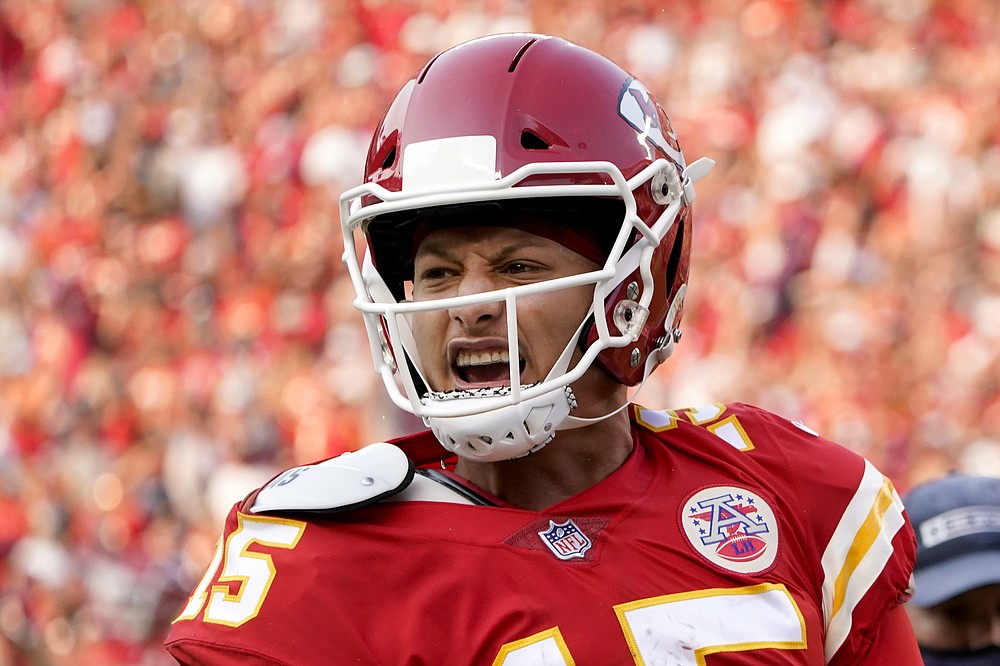 Kansas City Chiefs quarterback Patrick Mahomes celebrates after throwing a touchdown pass during the second half of an NFL football game against the Cleveland Browns Sunday, Sept. 12, 2021, in Kansas City, Mo. (AP Photo/Ed Zurga)