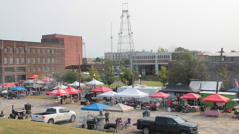 Competitors in the Withrow Family Rib Cook off set up at Washington Avenue on Saturday during the SouthArk Foundation's Outdoor Expo. (Caitlan Butler/News-Times)